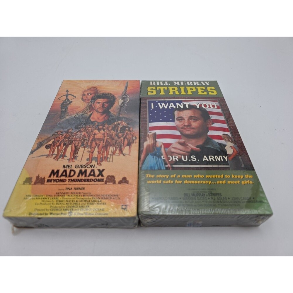 Pair Sealed VHS Movies  Mad Max & Stripes Bill Murray Mel Gibson